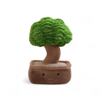 Kuscheltier Kawaii-Pflanze in Form eines lächelnden Bonsai mit braunem Topf und grünem Laub, auf weißem Hintergrund.