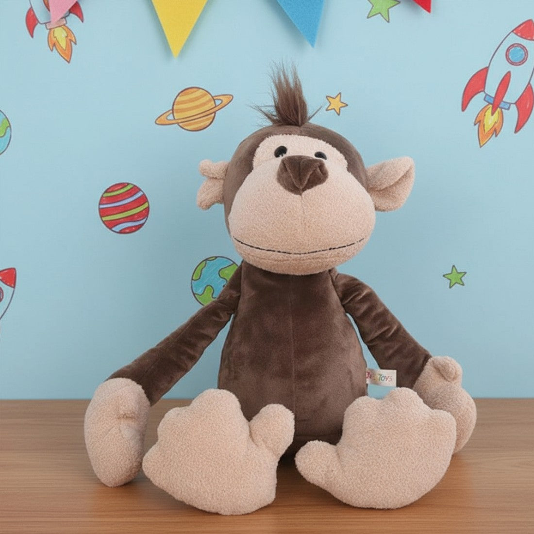 Affe Kuscheltier verschmitzt