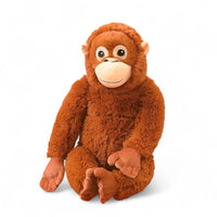 Großes braunes Orang-Utan-Kuscheltier, lächelndes Gesicht, bewegliche Arme und Beine, auf weißem Hintergrund.