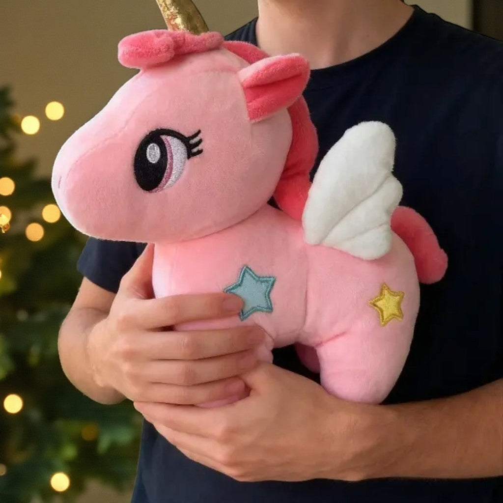 Niedliches Einhorn-Kuscheltier mit Sternen und magischen Flügeln