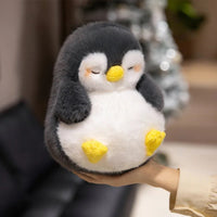 Pinguin Kuscheltier weich schlafend