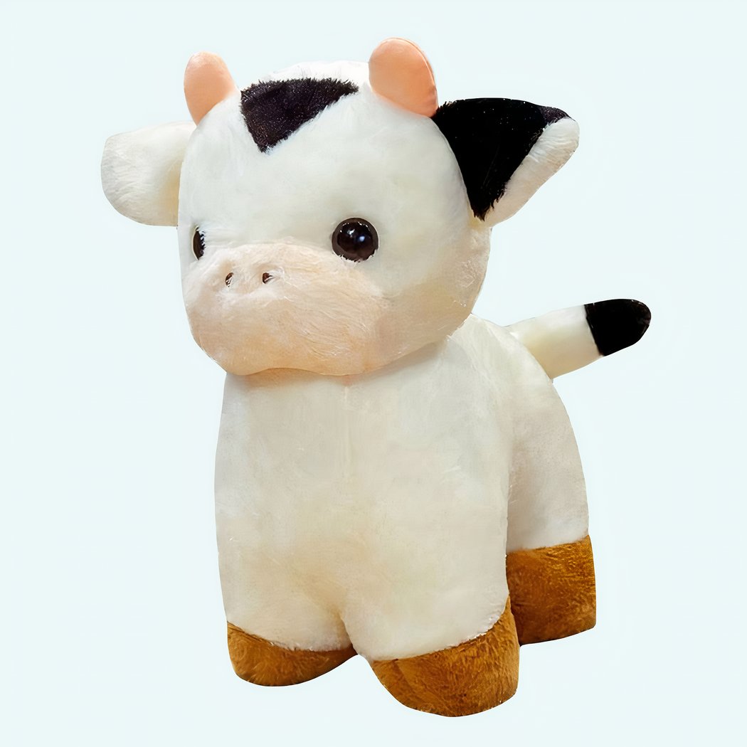 Schwarz-weißes Baby Kuh Kuscheltier