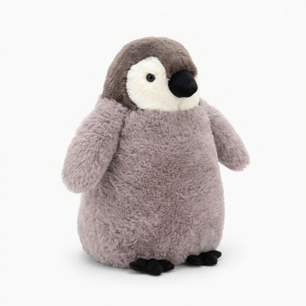 Kuscheliger Pinguin als Schlafkissen - Weißer Hintergrund seitlich