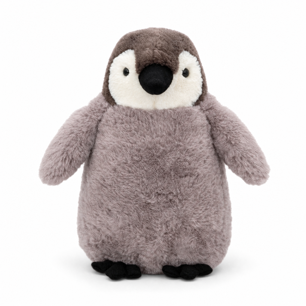 Kuscheliger Pinguin als Schlafkissen - Weißer Hintergrund frontal