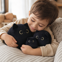 Schwarze Katze Kuscheltier mit großen Augen - Verwendung gemütlich drinnen