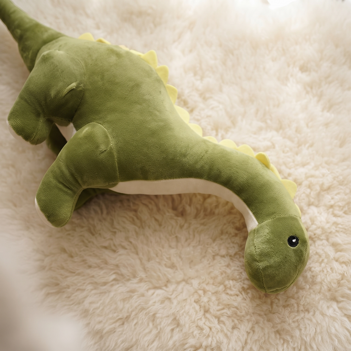 Grünes Diplodocus Kuscheltier mit langem Hals - Material-Detail