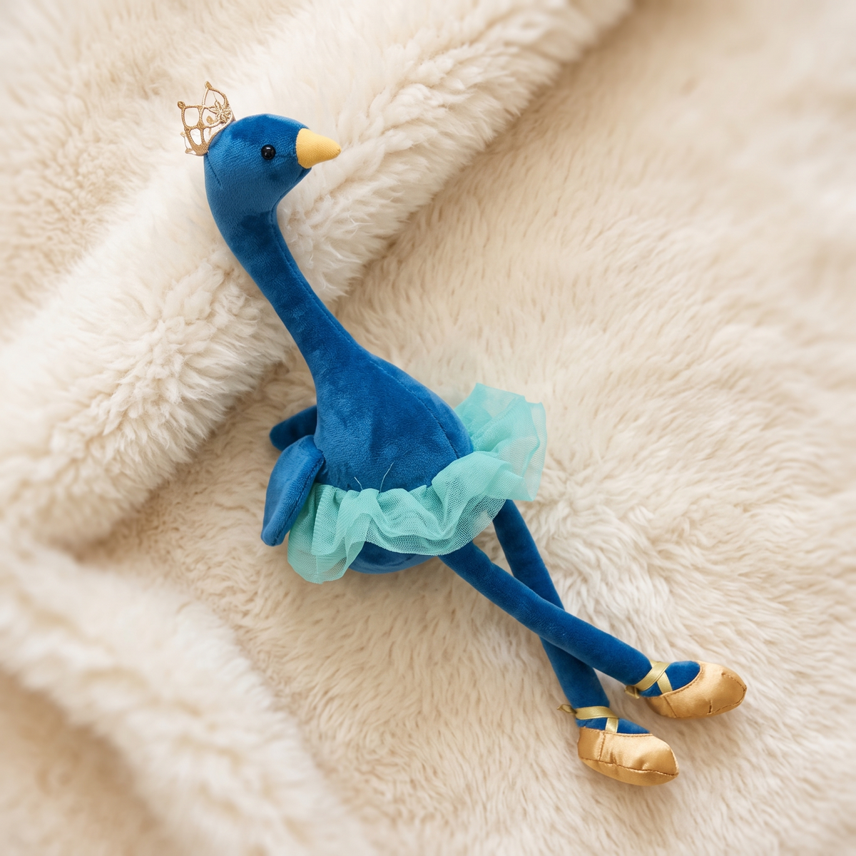 Blauer Flamingo Kuscheltier mit goldener Krone - Materialdetail