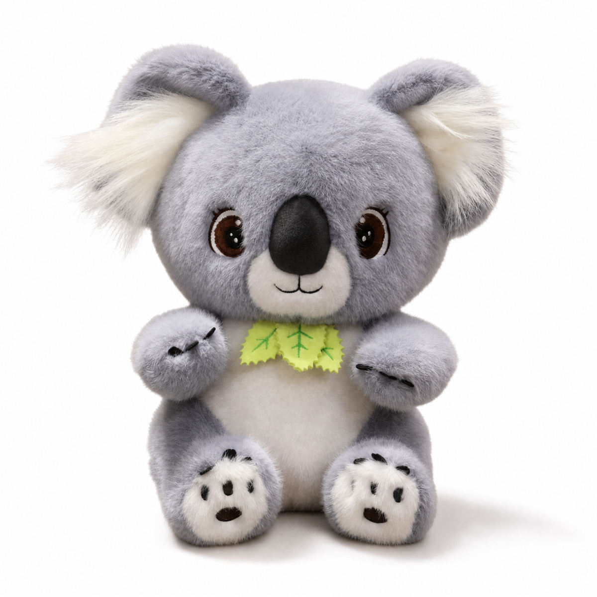 Graues Koala Kuscheltier mit Eukalyptusblatt - weißer Hintergrund Frontal