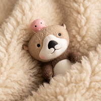 Otter Kuscheltier mit rosa Krake - Detail Material